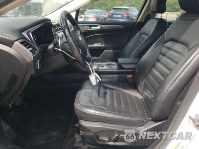 Zdjęcie 7 z 12 samochodu: 2017 FORD FUSION SE HYBRID VIN:3FA6P0LU6HR409531 - miniatura