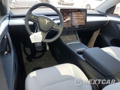 Zdjęcie 8 z 14 samochodu: 2023 TESLA MODEL Y VIN:7SAYGDEE5PA156623 - miniatura