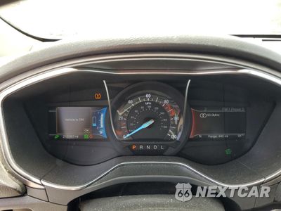 Zdjęcie 9 z 12 samochodu: 2017 FORD FUSION SE HYBRID VIN:3FA6P0LU0HR409654 - miniatura