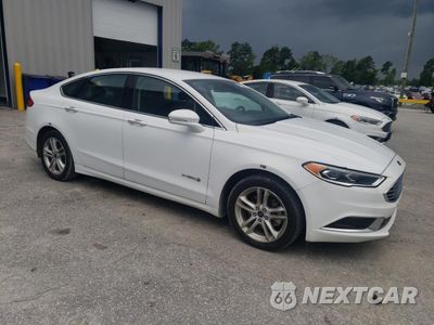 Czwarte zdjęcie samochodu z boku: 2018 FORD FUSION SE HYBRID VIN:3FA6P0LU4JR118774 - miniatura