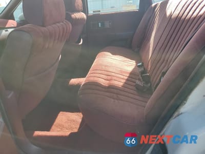 Zdjęcie 10 z 14 samochodu: 1992 CHEVROLET CAPRICE VIN:1G1BL53E3NR155173 - miniatura