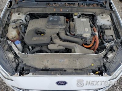 Zdjęcie 11 z 12 samochodu: 2018 FORD FUSION SE HYBRID VIN:3FA6P0LUXJR281929 - miniatura