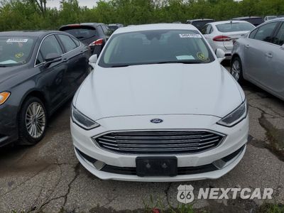 Piąte zdjęcie samochodu w środku: 2018 FORD FUSION SE HYBRID VIN:3FA6P0LU8JR172014 - miniatura