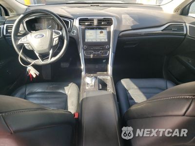 Zdjęcie 8 z 12 samochodu: 2017 FORD FUSION SE HYBRID VIN:3FA6P0LU3HR409583 - miniatura