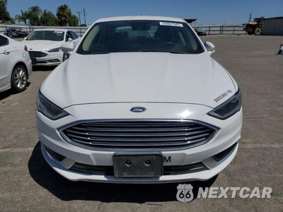 Piąte zdjęcie samochodu w środku: 2018 FORD FUSION SE HYBRID VIN:3FA6P0LU3JR129832 - miniatura