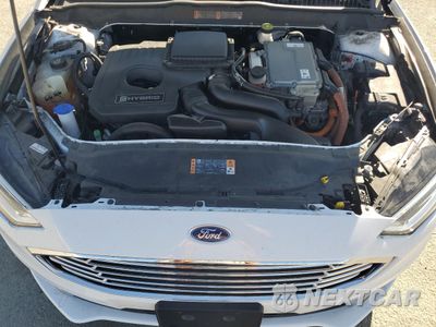 Zdjęcie 11 z 12 samochodu: 2018 FORD FUSION SE HYBRID VIN:3FA6P0LU0JR171553 - miniatura
