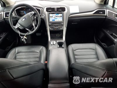 Zdjęcie 8 z 13 samochodu: 2017 FORD FUSION SE HYBRID VIN:3FA6P0LU5HR409083 - miniatura