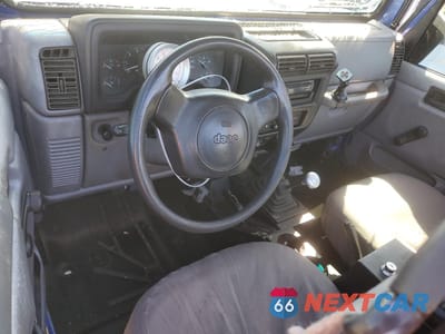 Zdjęcie 8 z 12 samochodu: 1997 JEEP WRANGLER / TJ SE VIN:1J4FY29P7VP459694 - miniatura