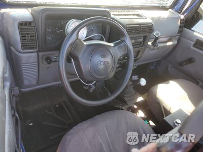 Zdjęcie 8 z 12 samochodu: 1997 JEEP WRANGLER / TJ SE VIN:1J4FY29P7VP459694 - miniatura