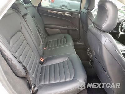 Zdjęcie 10 z 12 samochodu: 2018 FORD FUSION SE HYBRID VIN:3FA6P0LU7JR118638 - miniatura
