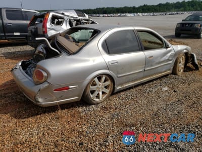 Trzecie zdjęcie samochodu z tyłu: 2003 NISSAN MAXIMA GLE VIN:JN1DA31A23T418511 - miniatura