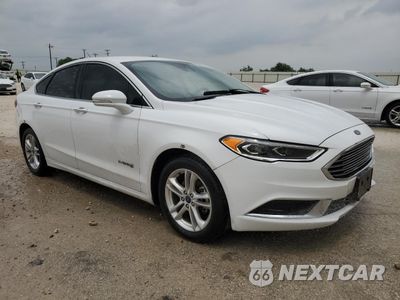 Czwarte zdjęcie samochodu z boku: 2018 FORD FUSION SE HYBRID VIN:3FA6P0LU6JR129811 - miniatura