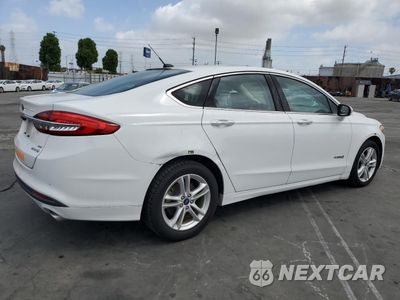 Trzecie zdjęcie samochodu z tyłu: 2018 FORD FUSION SE HYBRID VIN:3FA6P0LU1JR278644 - miniatura