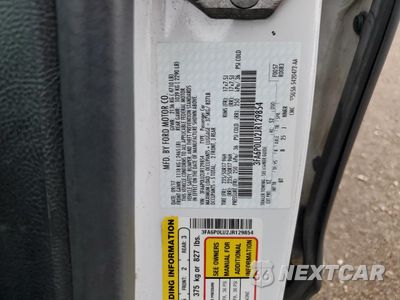 Zdjęcie 12 z 13 samochodu: 2018 FORD FUSION SE HYBRID VIN:3FA6P0LU2JR129854 - miniatura