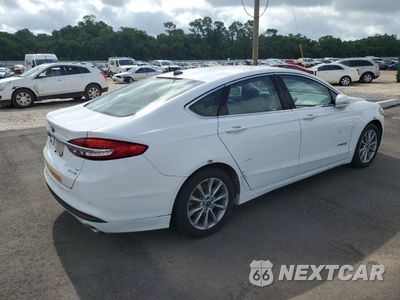 Trzecie zdjęcie samochodu z tyłu: 2017 FORD FUSION SE HYBRID VIN:3FA6P0LU5HR409228 - miniatura