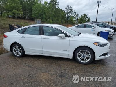 Czwarte zdjęcie samochodu z boku: 2018 FORD FUSION SE HYBRID VIN:3FA6P0LU4JR171765 - miniatura