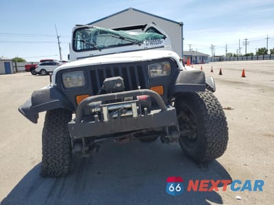 Piąte zdjęcie samochodu w środku: 1992 JEEP WRANGLER / YJ VIN:2J4FY29S2NJ550664 - miniatura