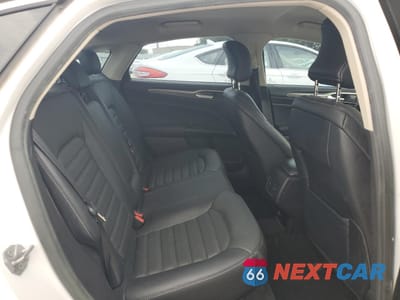 Zdjęcie 10 z 13 samochodu: 2018 FORD FUSION SE HYBRID VIN:3FA6P0LU9JR171809 - miniatura