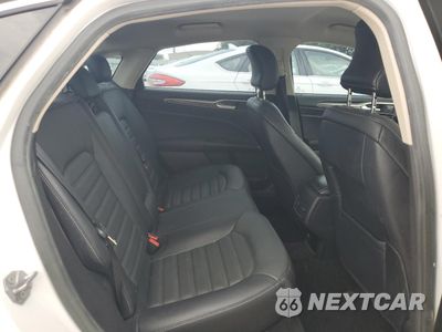 Zdjęcie 10 z 13 samochodu: 2018 FORD FUSION SE HYBRID VIN:3FA6P0LU9JR171809 - miniatura