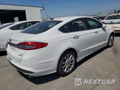 Trzecie zdjęcie samochodu z tyłu: 2017 FORD FUSION SE HYBRID VIN:3FA6P0LU9HR408941 - miniatura