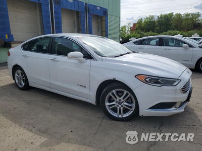 Czwarte zdjęcie samochodu z boku: 2018 FORD FUSION SE HYBRID VIN:3FA6P0LU2JR172042 - miniatura
