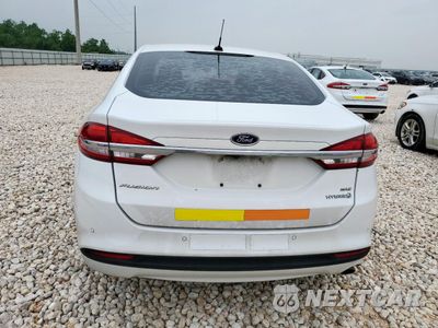 Zdjęcie 6 z 13 samochodu: 2017 FORD FUSION SE HYBRID VIN:3FA6P0LU1HR409047 - miniatura