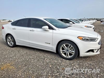 Czwarte zdjęcie samochodu z boku: 2018 FORD FUSION SE HYBRID VIN:3FA6P0LU2JR171750 - miniatura