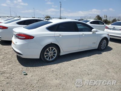 Trzecie zdjęcie samochodu z tyłu: 2017 FORD FUSION SE HYBRID VIN:3FA6P0LU1HR409162 - miniatura