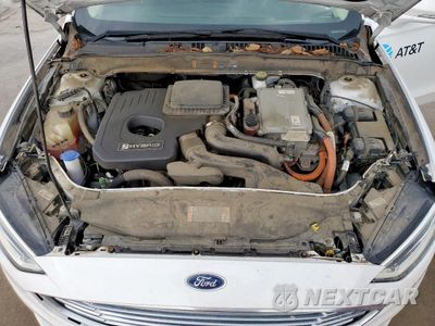 Zdjęcie 11 z 12 samochodu: 2018 FORD FUSION SE HYBRID VIN:3FA6P0LU9JR171650 - miniatura