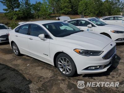 Czwarte zdjęcie samochodu z boku: 2017 FORD FUSION SE HYBRID VIN:3FA6P0LU2HR409543 - miniatura