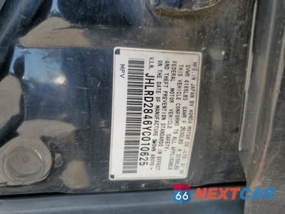 Zdjęcie 12 z 14 samochodu: 2000 HONDA CR-V LX VIN:JHLRD2846YC010625 - miniatura