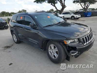 Czwarte zdjęcie samochodu z boku: 2014 JEEP GRAND CHEROKEE LAREDO VIN:1C4RJEAGXEC482818 - miniatura