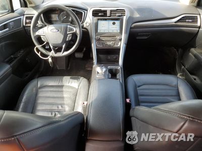 Zdjęcie 8 z 11 samochodu: 2017 FORD FUSION SE HYBRID VIN:3FA6P0LU1HR409503 - miniatura