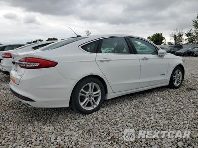 Trzecie zdjęcie samochodu z tyłu: 2018 FORD FUSION SE HYBRID VIN:3FA6P0LU0JR171858 - miniatura
