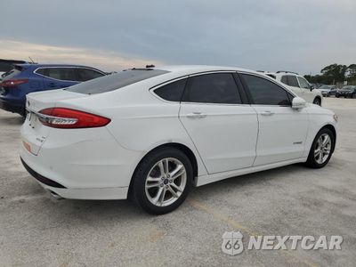 Trzecie zdjęcie samochodu z tyłu: 2017 FORD FUSION SE HYBRID VIN:3FA6P0LU1HR400753 - miniatura