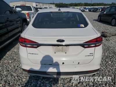 Zdjęcie 6 z 12 samochodu: 2017 FORD FUSION SE HYBRID VIN:3FA6P0LU7HR409568 - miniatura