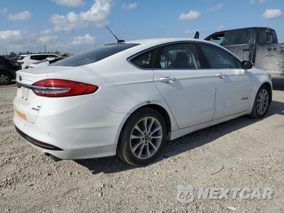 Trzecie zdjęcie samochodu z tyłu: 2017 FORD FUSION SE HYBRID VIN:3FA6P0LU2HR410045 - miniatura