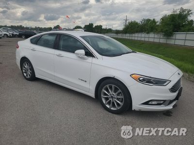 Czwarte zdjęcie samochodu z boku: 2017 FORD FUSION SE HYBRID VIN:3FA6P0LU8HR408901 - miniatura