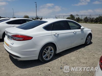 Trzecie zdjęcie samochodu z tyłu: 2018 FORD FUSION SE HYBRID VIN:3FA6P0LU2JR129837 - miniatura
