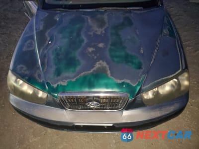 Zdjęcie 11 z 12 samochodu: 2002 HYUNDAI ELANTRA GLS VIN:KMHDN45D72U270727 - miniatura