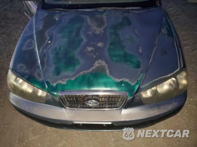 Zdjęcie 11 z 12 samochodu: 2002 HYUNDAI ELANTRA GLS VIN:KMHDN45D72U270727 - miniatura