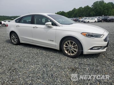 Czwarte zdjęcie samochodu z boku: 2017 FORD FUSION SE HYBRID VIN:3FA6P0LU0HR410092 - miniatura