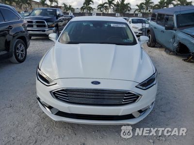 Piąte zdjęcie samochodu w środku: 2017 FORD FUSION SE HYBRID VIN:3FA6P0LU6HR359679 - miniatura