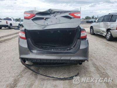 Zdjęcie 6 z 12 samochodu: 2014 FORD FUSION S VIN:3FA6P0G74ER339172 - miniatura