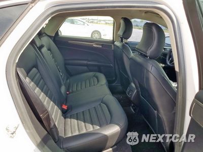 Zdjęcie 10 z 13 samochodu: 2018 FORD FUSION SE HYBRID VIN:3FA6P0LU8JR171638 - miniatura