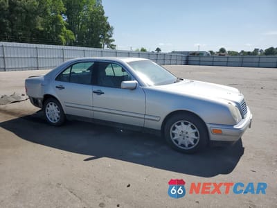 Czwarte zdjęcie samochodu z boku: 1996 MERCEDES-BENZ E 300D VIN:WDBJF20F9TJ001745 - miniatura