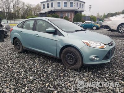 Czwarte zdjęcie samochodu z boku: 2012 FORD FOCUS SE VIN:1FAHP3F22CL456003 - miniatura