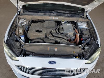 Zdjęcie 11 z 13 samochodu: 2017 FORD FUSION SE HYBRID VIN:3FA6P0LUXHR409693 - miniatura