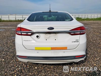 Zdjęcie 6 z 12 samochodu: 2017 FORD FUSION SE HYBRID VIN:3FA6P0LU3HR359686 - miniatura