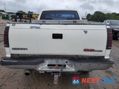 Zdjęcie 6 z 12 samochodu: 1993 GMC SIERRA K1500 VIN:1GTEK14K1PZ532221 - miniatura